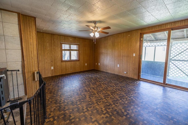 225 Todds Corner Rd, Saint Albans, ME 04971 - unfurnished room featuring a ceiling fan and wooden walls