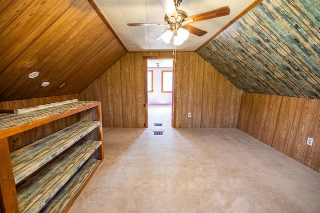 225 Todds Corner Rd, Saint Albans, ME 04971 - bonus room with wood walls, a ceiling fan, vaulted ceiling, and carpet