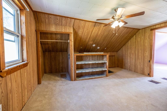 225 Todds Corner Rd, Saint Albans, ME 04971 - bonus room featuring wooden walls, vaulted ceiling, carpet, plenty of natural light, and a ceiling fan