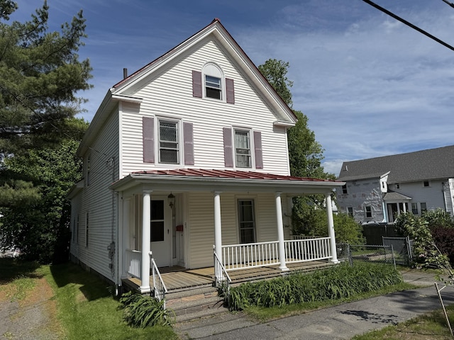21 Fern St, Bangor, ME 04401 - view of front of property featuring covered porch, a standing seam roof, and metal roof