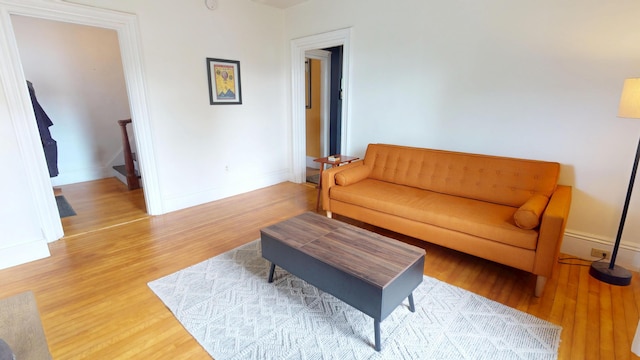 21 Fern St, Bangor, ME 04401 - living area featuring light wood-style flooring and baseboards