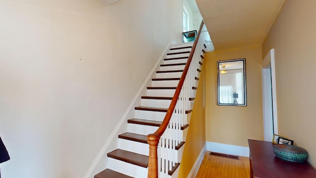 21 Fern St, Bangor, ME 04401 - stairs featuring baseboards and wood finished floors