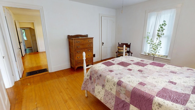 21 Fern St, Bangor, ME 04401 - bedroom featuring light wood-style floors, multiple windows, and baseboards