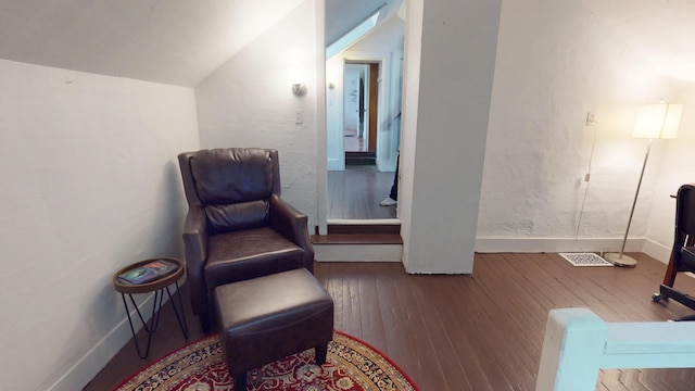 21 Fern St, Bangor, ME 04401 - sitting room with hardwood / wood-style flooring, vaulted ceiling, and baseboards