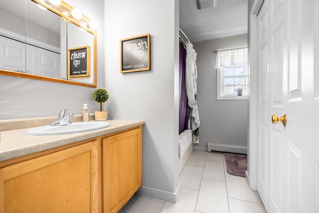 bathroom with baseboard heating, vanity, tile patterned floors, curtained shower, and baseboards