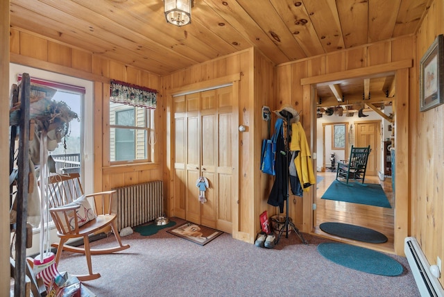 237 River Rd, Avon, ME 04966 - sunroom / solarium featuring baseboard heating and radiator heating unit