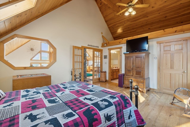 237 River Rd, Avon, ME 04966 - bedroom featuring french doors, light wood-style flooring, wood ceiling, and high vaulted ceiling