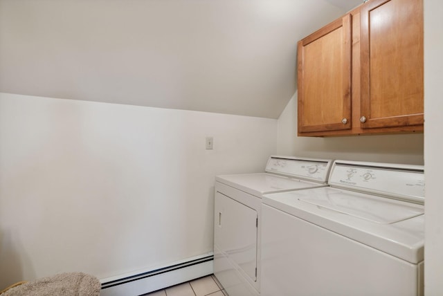 237 River Rd, Avon, ME 04966 - washroom with baseboard heating, washing machine and clothes dryer, cabinet space, and light tile patterned flooring