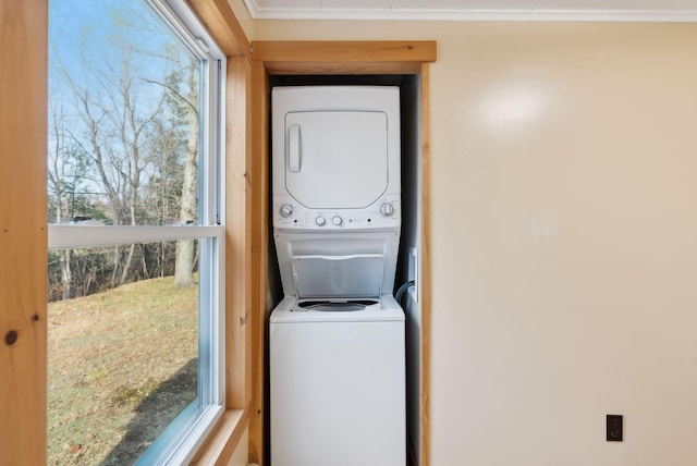 237 River Rd, Avon, ME 04966 - laundry room featuring stacked washer / dryer