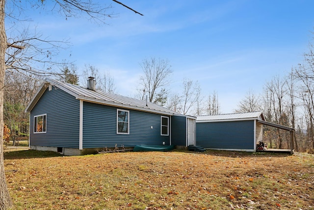 237 River Rd, Avon, ME 04966 - rear view of property featuring metal roof