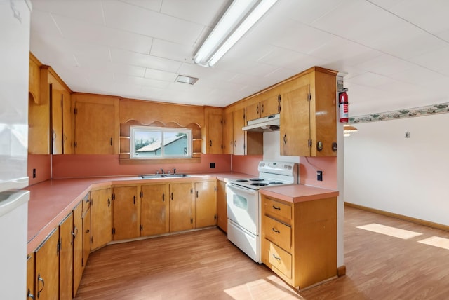 237 River Rd, Avon, ME 04966 - kitchen with electric stove, under cabinet range hood, light wood-style floors, and a sink