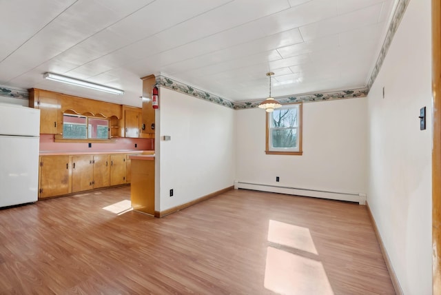 237 River Rd, Avon, ME 04966 - interior space with a baseboard radiator, light wood-style flooring, and baseboards