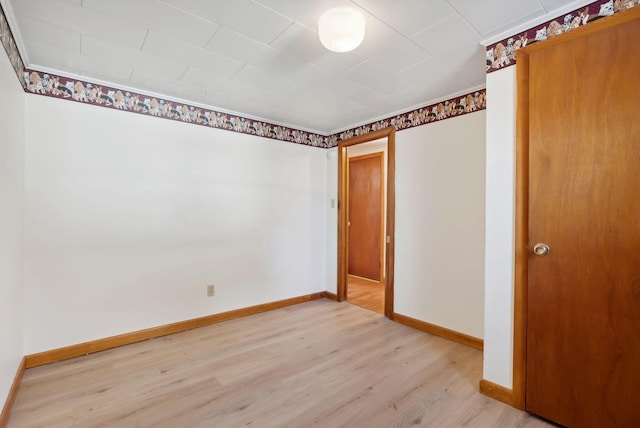 237 River Rd, Avon, ME 04966 - unfurnished bedroom featuring light wood-style floors and baseboards