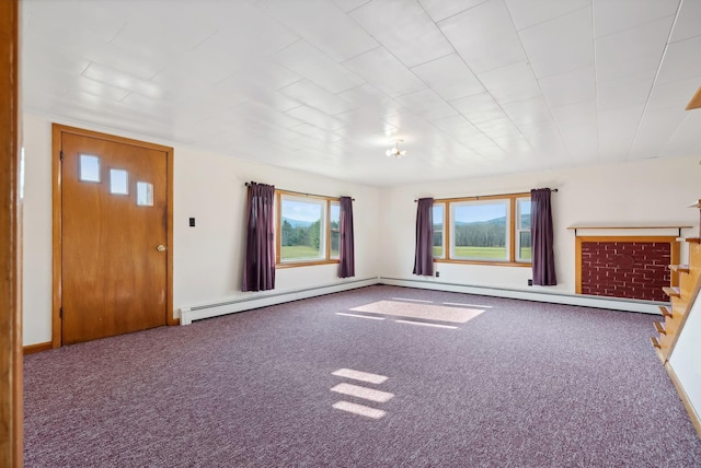 237 River Rd, Avon, ME 04966 - unfurnished living room featuring carpet flooring and baseboard heating