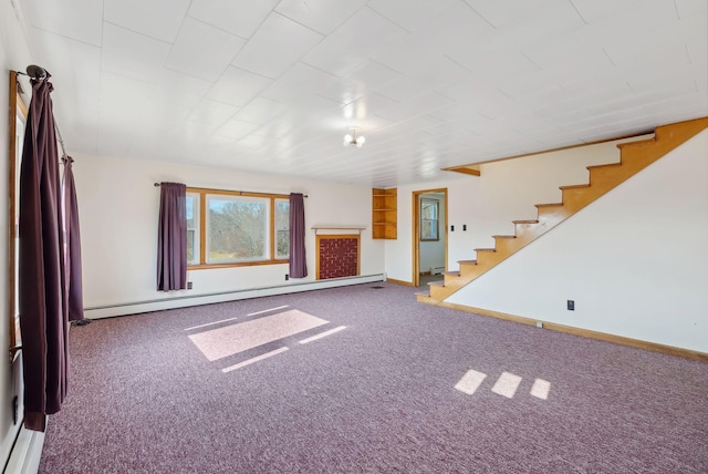 237 River Rd, Avon, ME 04966 - unfurnished living room with a baseboard heating unit, stairs, carpet floors, and baseboards