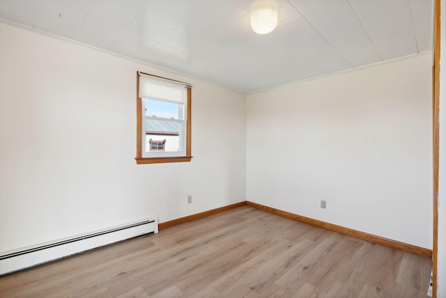 237 River Rd, Avon, ME 04966 - unfurnished room featuring baseboard heating, light wood-style flooring, and baseboards