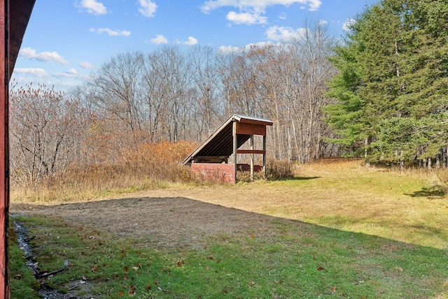 237 River Rd, Avon, ME 04966 - view of grassy yard with a wooded view