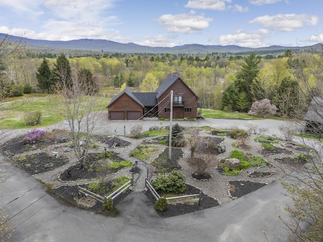 237 River Rd, Avon, ME 04966 - view of home's community with a mountain view, a wooded view, and a garage