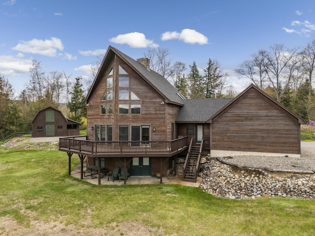 237 River Rd, Avon, ME 04966 - back of house with a wooden deck, stairway, a lawn, roof with shingles, and a patio area