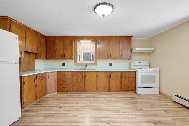 237 River Rd, Avon, ME 04966 - kitchen with white appliances, under cabinet range hood, brown cabinets, light wood-style floors, and crown molding