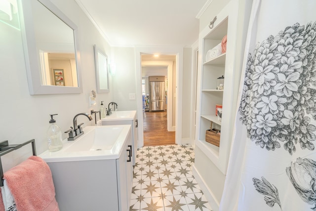bathroom with built in shelves and vanity