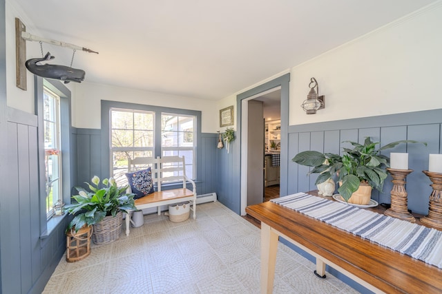 sunroom featuring healthy amount of natural light