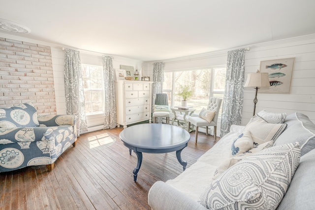 living area with hardwood / wood-style flooring