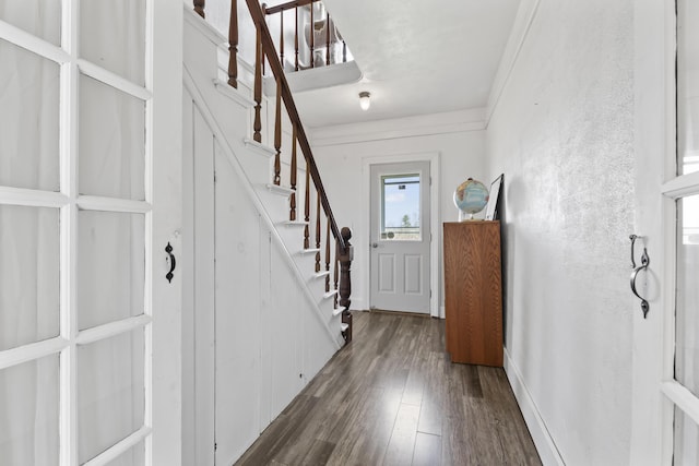 1568 Hill Rd, Canaan, ME 04924 - entryway with dark wood-style flooring, stairway, and a textured wall