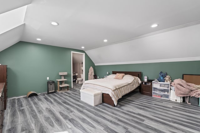 1568 Hill Rd, Canaan, ME 04924 - bedroom featuring vaulted ceiling, wood finished floors, recessed lighting, ensuite bath, and baseboards