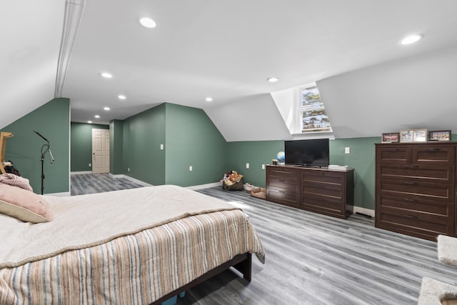 1568 Hill Rd, Canaan, ME 04924 - bedroom featuring baseboards, vaulted ceiling, recessed lighting, and wood finished floors