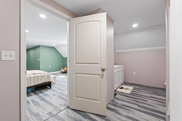 1568 Hill Rd, Canaan, ME 04924 - bedroom featuring light wood-style flooring, recessed lighting, and vaulted ceiling