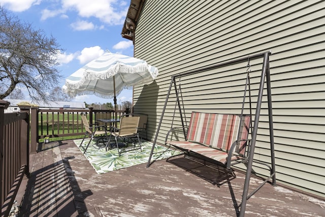 1568 Hill Rd, Canaan, ME 04924 - wooden terrace with outdoor dining area