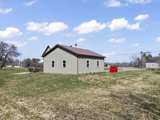1568 Hill Rd, Canaan, ME 04924 - view of home's exterior with a yard