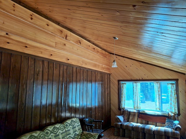 27 Kingman Beach Rd, Osborn, ME 04605 - living room featuring wood walls, wooden ceiling, and wood finished floors