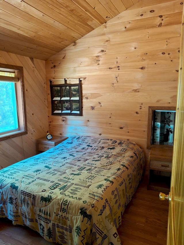 27 Kingman Beach Rd, Osborn, ME 04605 - bedroom with lofted ceiling, wood walls, wood ceiling, and wood finished floors