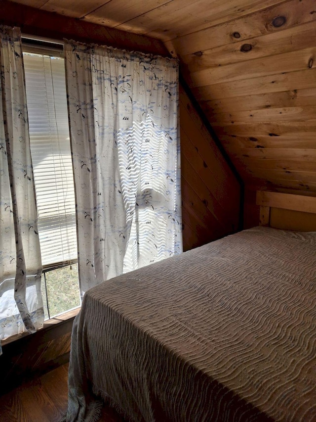 27 Kingman Beach Rd, Osborn, ME 04605 - bedroom featuring vaulted ceiling, wood ceiling, and wood finished floors