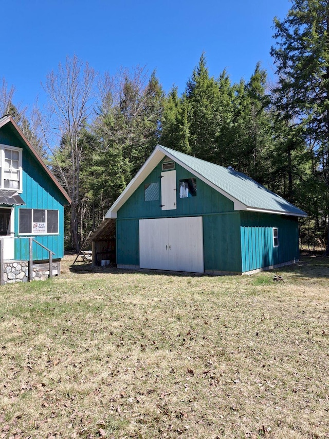 27 Kingman Beach Rd, Osborn, ME 04605 - view of pole building with a lawn