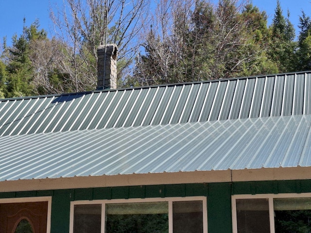 27 Kingman Beach Rd, Osborn, ME 04605 - exterior view of metal roof and a chimney