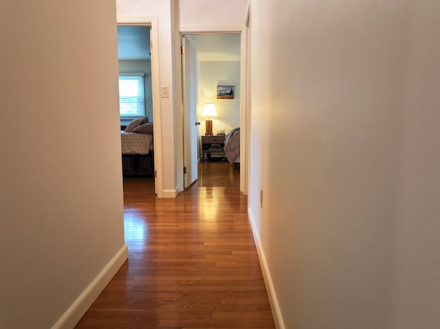 11 Moreau Ave, Lewiston, ME 04240 - corridor with wood finished floors and baseboards