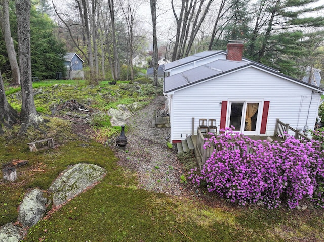 11 Moreau Ave, Lewiston, ME 04240 - view of side of home with a chimney