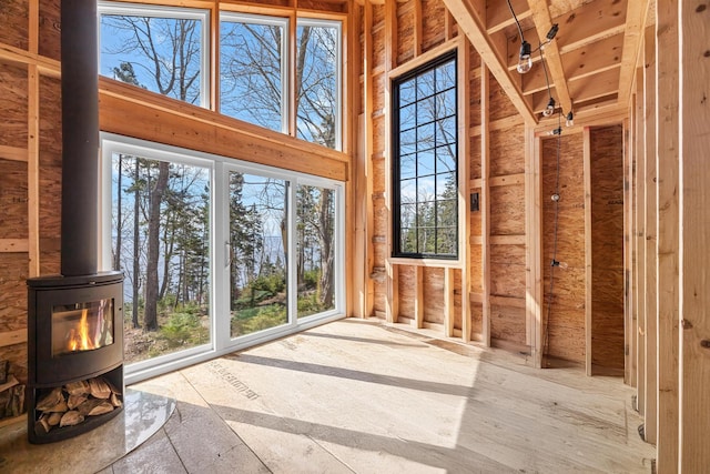 197 E Shore Dr, Islesboro, ME 04848 - misc room featuring a wood stove and a towering ceiling
