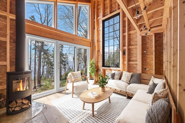 197 E Shore Dr, Islesboro, ME 04848 - sunroom with a wood stove and vaulted ceiling