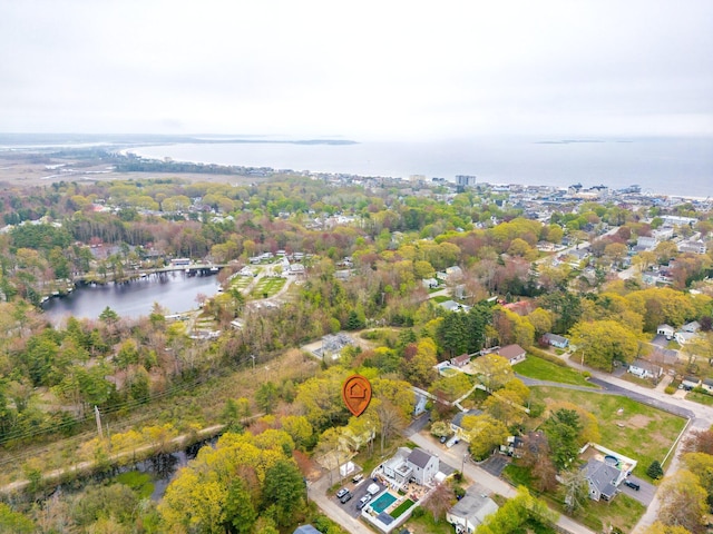 aerial view of property's location featuring a nearby body of water