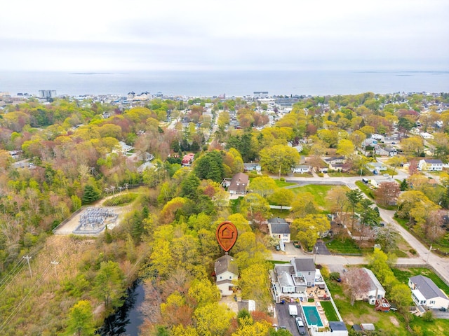 aerial view of property's location with nearby suburban area