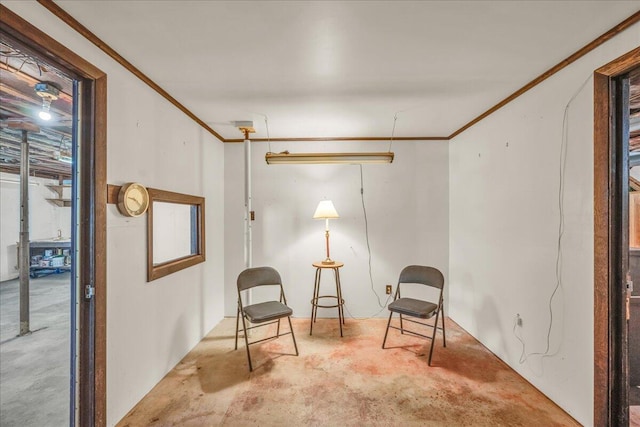 1270 Main St, Mount Desert, ME 04660 - sitting room with unfinished concrete flooring and crown molding