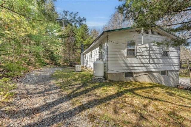 1270 Main St, Mount Desert, ME 04660 - view of side of property featuring cooling unit and a yard