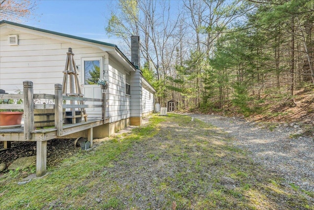 1270 Main St, Mount Desert, ME 04660 - view of side of home with a chimney