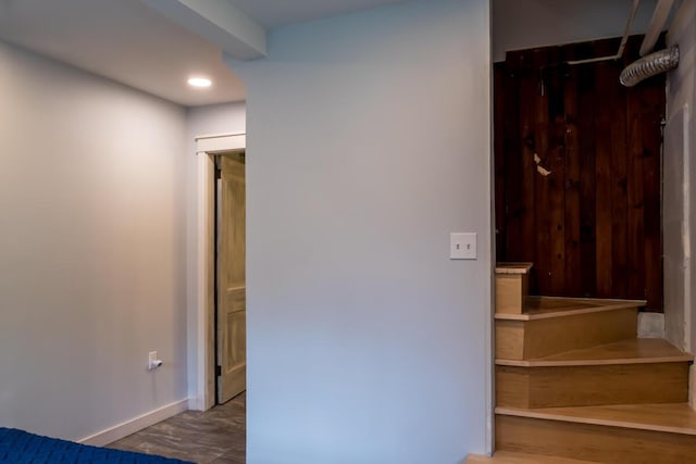 staircase with baseboards and recessed lighting