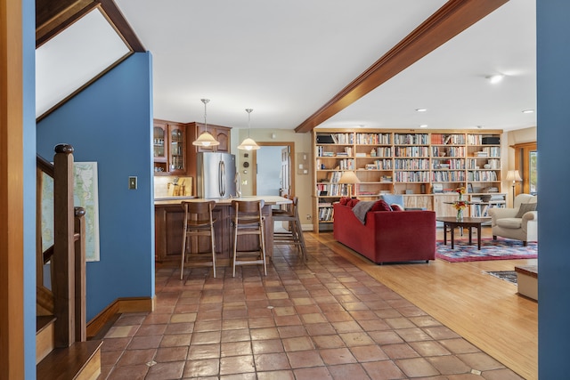 living room featuring baseboards