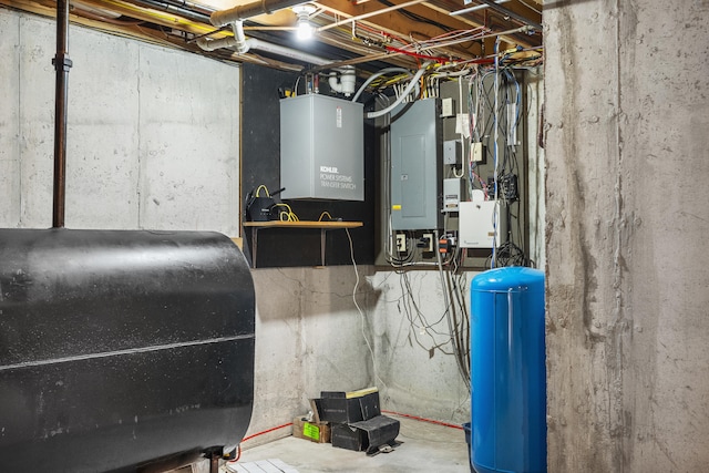utility room with oil tank and electric panel